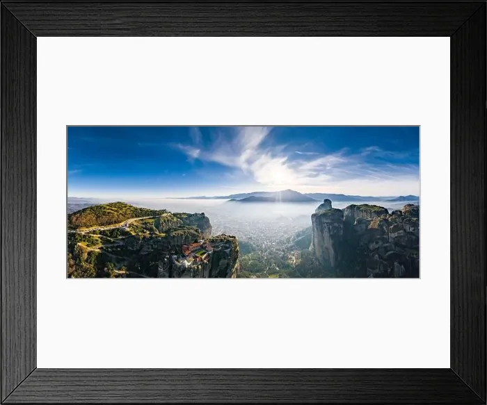 Framed Print : Aerial view of monastery Trinity and breathtaking pictures of valley and landmark canyon of Meteora at sunset Framed Print : Aerial view of monastery Trinity and breathtaking pictures of valley and landmark canyon of Meteora at sunset