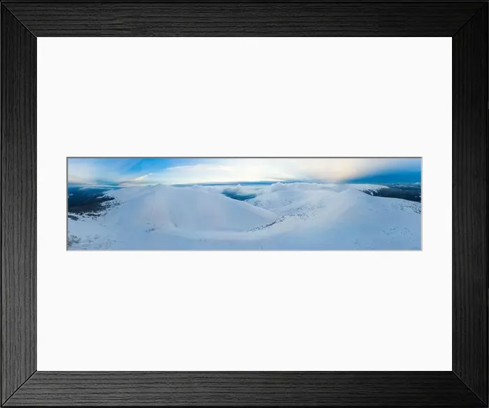 Framed Print : Mesmerizing mountain panorama of hills cliffs covered with snow on a cloudy winter day Framed Print : Mesmerizing mountain panorama of hills cliffs covered with snow on a cloudy winter day
