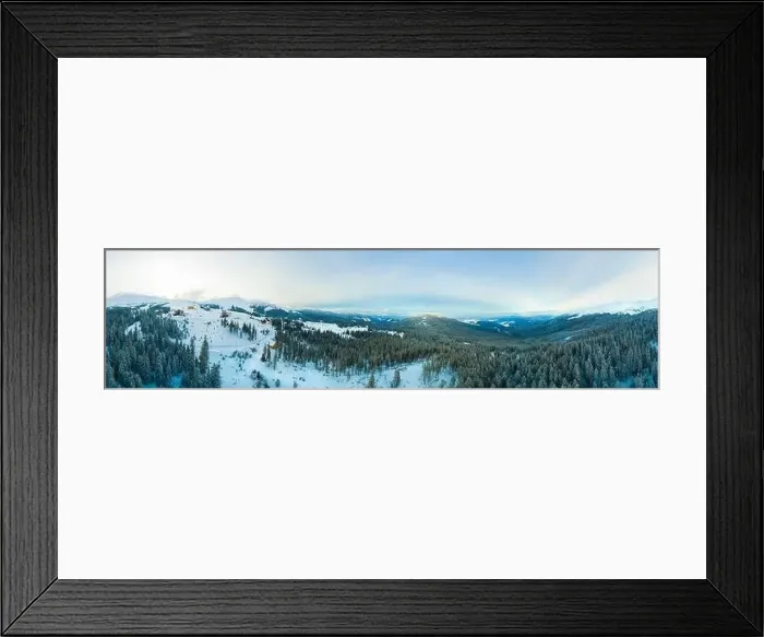 Framed Print : Aerial view of the stunning winter panorama of the snowy slopes and hills among the lush white clouds Framed Print : Aerial view of the stunning winter panorama of the snowy slopes and hills among the lush white clouds