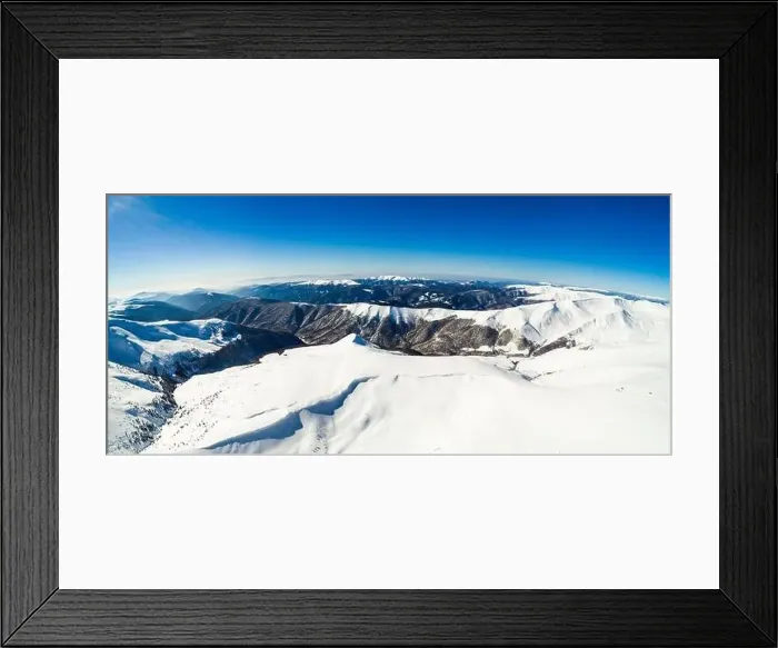 Framed Print : Stunning aerial view of the mountain ranges on a winter sunny frosty day Framed Print : Stunning aerial view of the mountain ranges on a winter sunny frosty day
