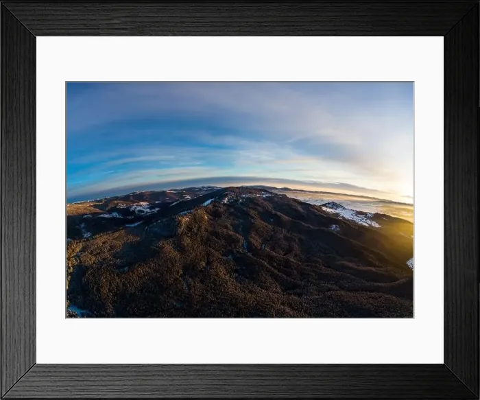 Framed Print : Aerial view amazing view of the mountains and slopes covered with dense thickets of fir trees Framed Print : Aerial view amazing view of the mountains and slopes covered with dense thickets of fir trees