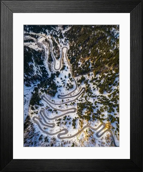 Framed Print : Aerial view of curves of Maloja Pass road, Bregaglia Valley, canton of Graubünden, Engadine, Switzerland Framed Print : Aerial view of curves of Maloja Pass road, Bregaglia Valley, canton of Graubünden, Engadine, Switzerland
