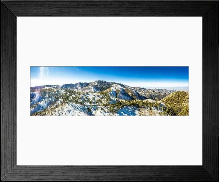 Framed Print : A panorama aerial image of the summit of Mt. Lemmon outside of Tucson, Arizona covered in snow with a vibrant blue sky Framed Print : A panorama aerial image of the summit of Mt. Lemmon outside of Tucson, Arizona covered in snow with a vibrant blue sky