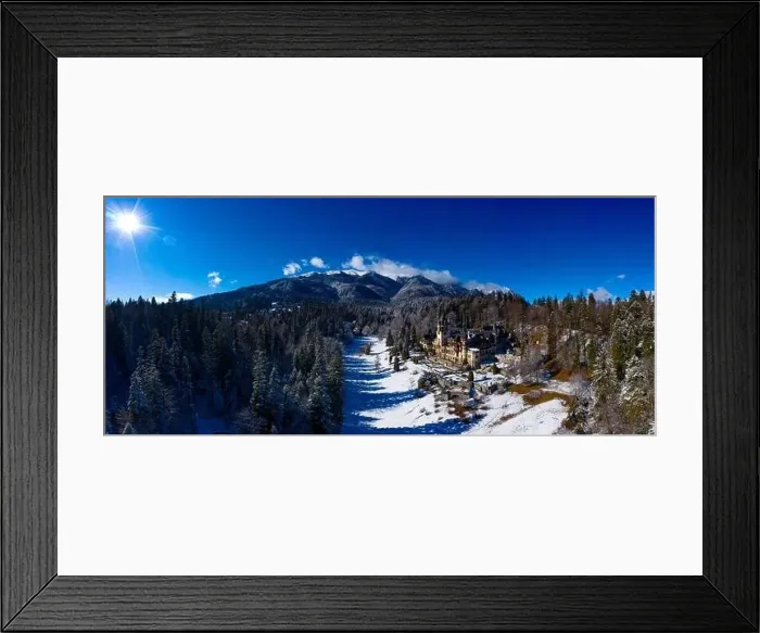 Framed Print : Aerial drone panoramic view of a beautiful Peles castle in Sinaia in the winter season, Transylvania, Romania Framed Print : Aerial drone panoramic view of a beautiful Peles castle in Sinaia in the winter season, Transylvania, Romania
