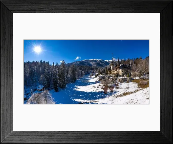 Framed Print : Aerial drone panoramic view of a beautiful Peles castle in Sinaia in the winter season, Transylvania, Romania Framed Print : Aerial drone panoramic view of a beautiful Peles castle in Sinaia in the winter season, Transylvania, Romania