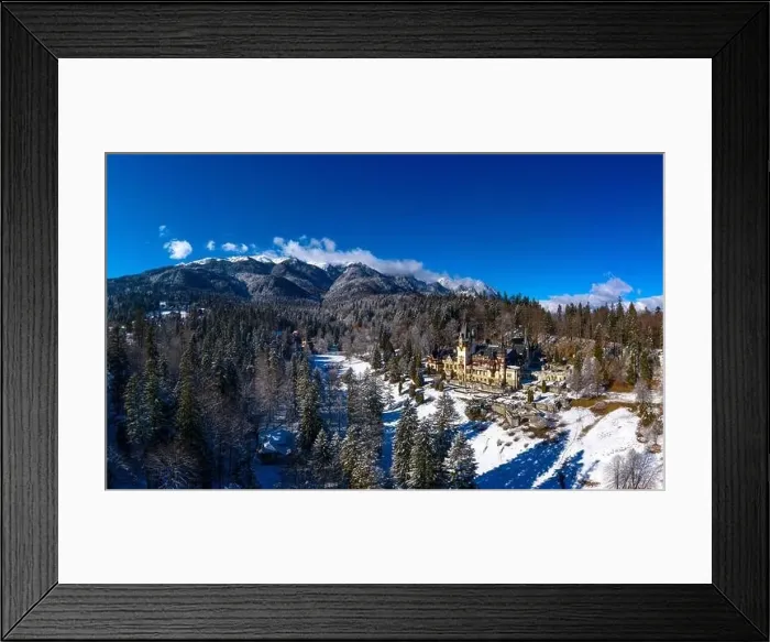 Framed Print : Aerial drone panoramic view of a beautiful Peles castle in Sinaia in the winter season, Transylvania, Romania Framed Print : Aerial drone panoramic view of a beautiful Peles castle in Sinaia in the winter season, Transylvania, Romania