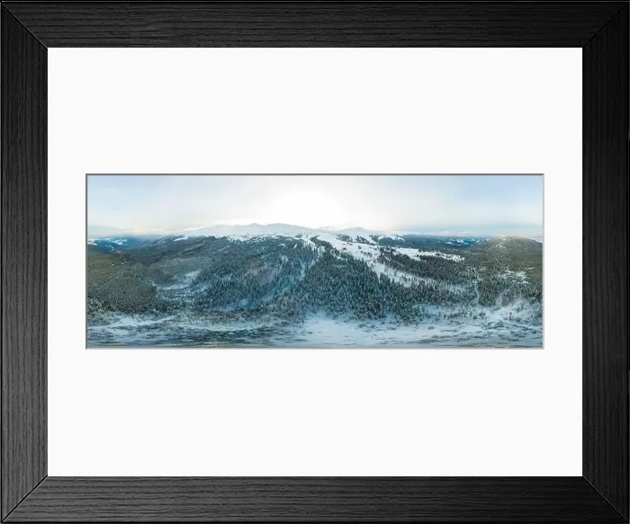 Framed Print : Fabulous evening panorama with snow-capped mountains and hills with bright sun and fog on a frosty winter evening Framed Print : Fabulous evening panorama with snow-capped mountains and hills with bright sun and fog on a frosty winter evening