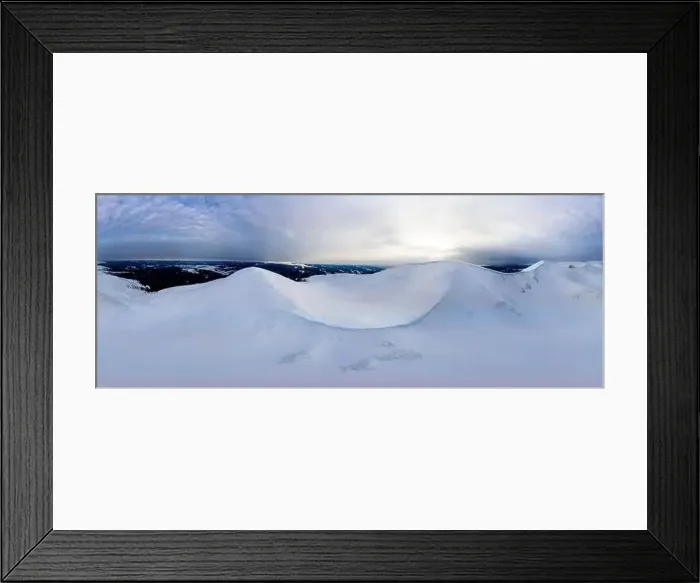 Framed Print : Aerial view of the stunning winter panorama of the snowy slopes and hills among the lush white clouds Framed Print : Aerial view of the stunning winter panorama of the snowy slopes and hills among the lush white clouds