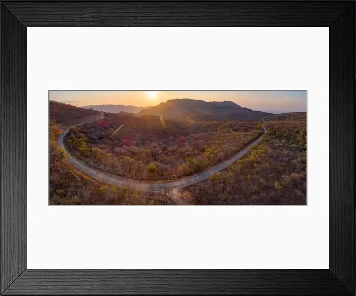 Framed Print : An aerial view of a road in the bush in Zimbabwe Framed Print : An aerial view of a road in the bush in Zimbabwe