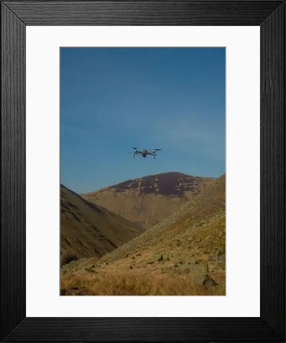 Framed Print : A Drone Hovers Above Hills and Valley in the Scottish Borders on a Sunny Day Framed Print : A Drone Hovers Above Hills and Valley in the Scottish Borders on a Sunny Day