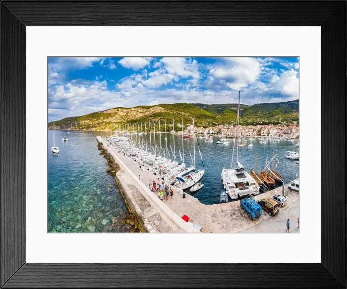 Framed Print : Aerial panoramic view of city Komiza - the one of numerous port towns in Croatia Framed Print : Aerial panoramic view of city Komiza - the one of numerous port towns in Croatia