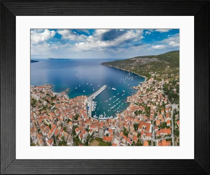 Framed Print : Aerial panoramic view of city Komiza - the one of numerous port towns in Croatia Framed Print : Aerial panoramic view of city Komiza - the one of numerous port towns in Croatia