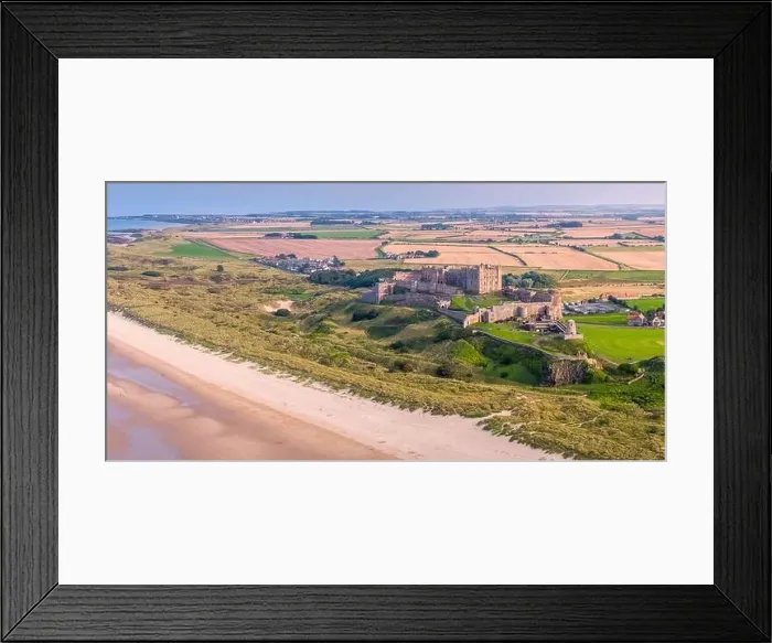 Framed Print : Aerial view by drone of Bamburgh Castle, Bamburgh, Northumberland, England, United Kingdom, Europe Framed Print : Aerial view by drone of Bamburgh Castle, Bamburgh, Northumberland, England, United Kingdom, Europe