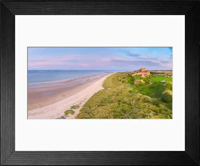 Framed Print : Aerial view by drone of Bamburgh Castle, Bamburgh, Northumberland, England, United Kingdom, Europe Framed Print : Aerial view by drone of Bamburgh Castle, Bamburgh, Northumberland, England, United Kingdom, Europe