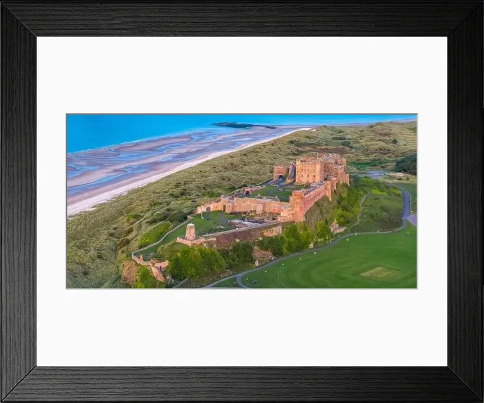 Framed Print : Aerial view by drone of Bamburgh Castle, Bamburgh, Northumberland, England, United Kingdom, Europe Framed Print : Aerial view by drone of Bamburgh Castle, Bamburgh, Northumberland, England, United Kingdom, Europe