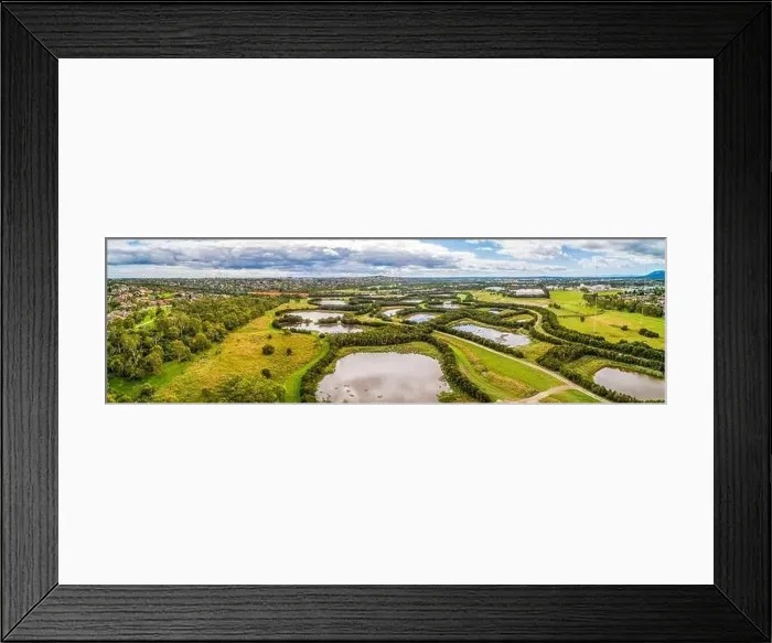 Framed Print : Wide aerial landscape of Tirhatuan Wetlands and surrounding suburbs in Melbourne, Australia Framed Print : Wide aerial landscape of Tirhatuan Wetlands and surrounding suburbs in Melbourne, Australia