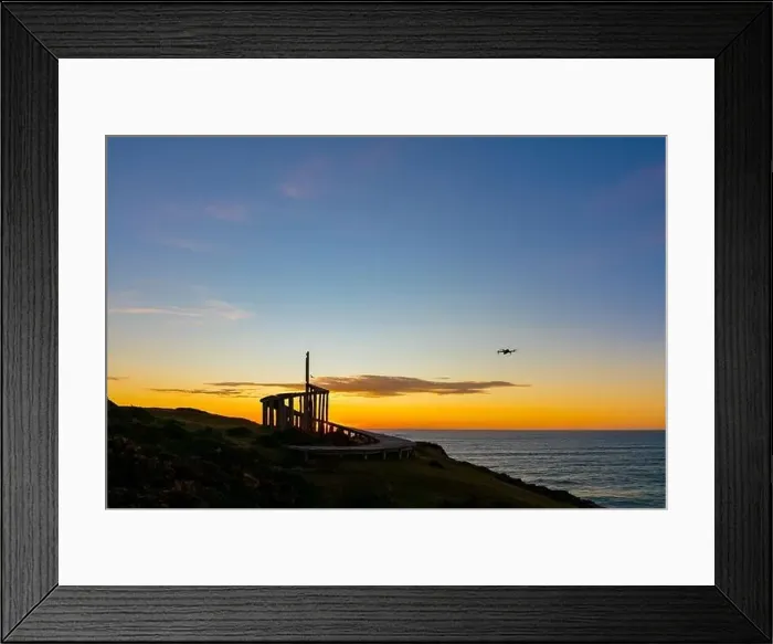 Framed Print : after sunset with view to the dock of time in the archipelago of chiloe, with drone flying by Framed Print : after sunset with view to the dock of time in the archipelago of chiloe, with drone flying by