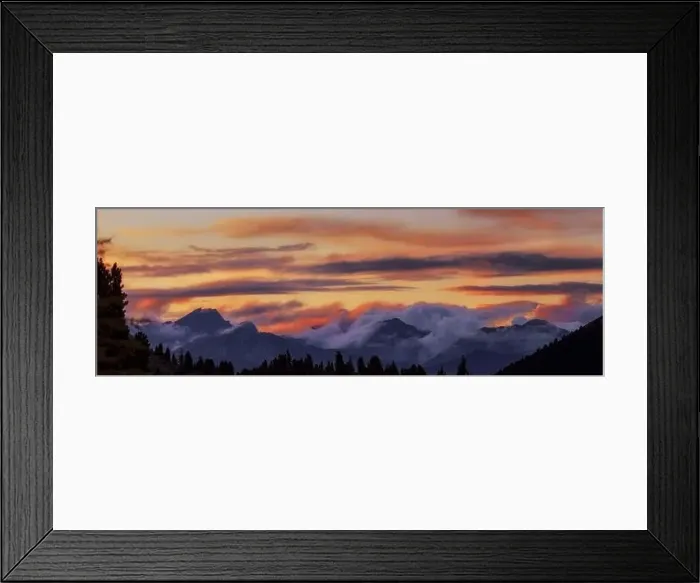 Framed Print : Wide angle panorama silhouette forest and mountain tops in red orange blue clouds gradient sunset Framed Print : Wide angle panorama silhouette forest and mountain tops in red orange blue clouds gradient sunset