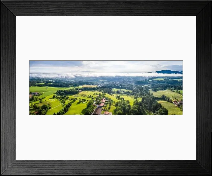 Framed Print : Aerial Bad Toelz Bavarian Alps. Golf Course. Blomberg Mountain. Morning Drone Shot with some clouds in the sky Framed Print : Aerial Bad Toelz Bavarian Alps. Golf Course. Blomberg Mountain. Morning Drone Shot with some clouds in the sky