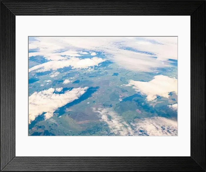 Framed Print : Aerial above high angle view from airplane over United Kingdom countryside with farm fields and wind turbines and clouds Framed Print : Aerial above high angle view from airplane over United Kingdom countryside with farm fields and wind turbines and clouds