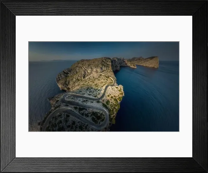 Framed Print : Aerial view / Panorama of a serpentine road on Mallorca in the northern mountains / Cap Formentor Framed Print : Aerial view / Panorama of a serpentine road on Mallorca in the northern mountains / Cap Formentor