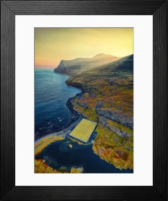 Framed Print : Eidi Soccer Field by the Ocean on the Faroe Islands, post processed in HDR Framed Print : Eidi Soccer Field by the Ocean on the Faroe Islands, post processed in HDR