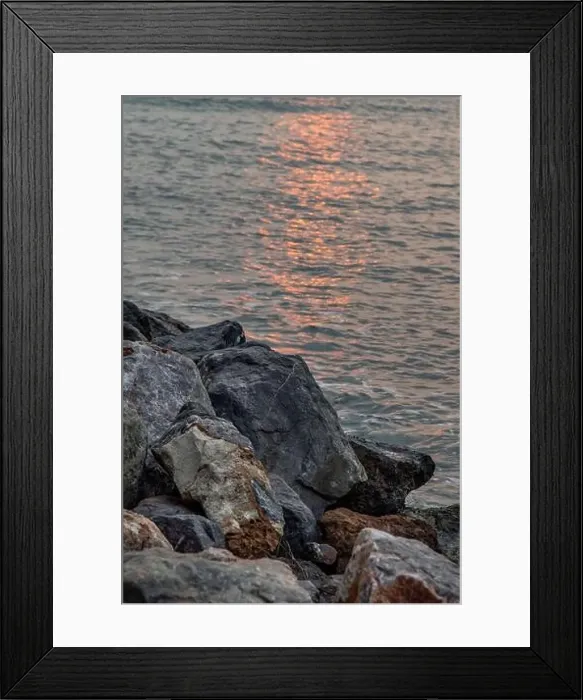 Framed Print : Rocks and sea : View of sea waves hitting rocks on the Calm beach in the morning. No focus, specifically Framed Print : Rocks and sea : View of sea waves hitting rocks on the Calm beach in the morning. No focus, specifically