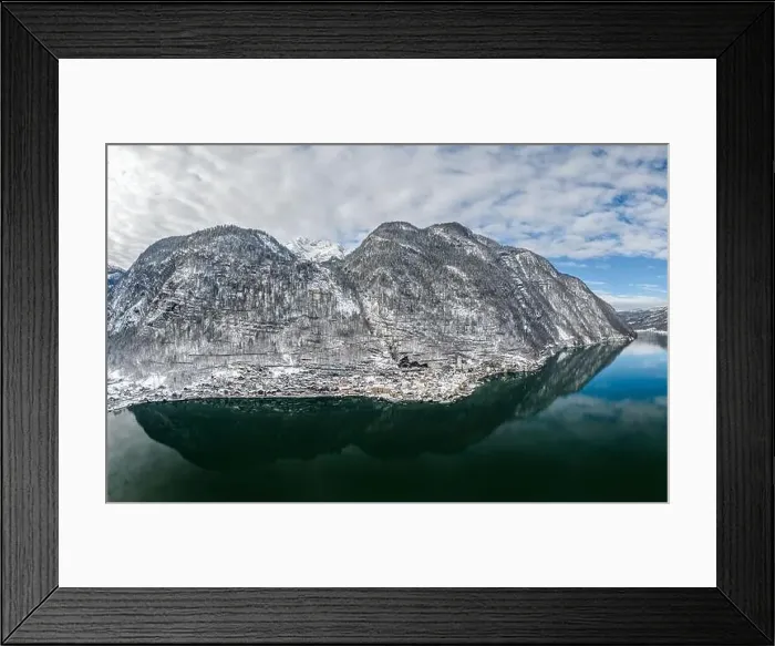 Framed Print : Aerial drone shot of beautiful Austria village Hallstatt at foot of eastern alps mountain covered by snow in winter time Framed Print : Aerial drone shot of beautiful Austria village Hallstatt at foot of eastern alps mountain covered by snow in winter time