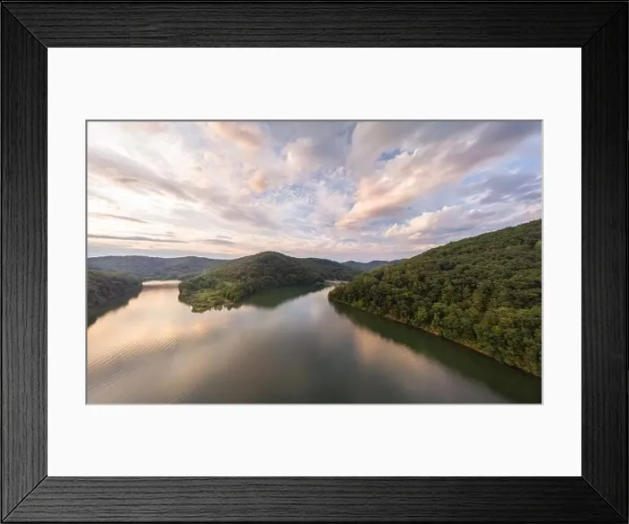Framed Print : An aerial view of Stonewall Jackson Lake and the dam in the distant foreground with clouds overhead at sunset Framed Print : An aerial view of Stonewall Jackson Lake and the dam in the distant foreground with clouds overhead at sunset