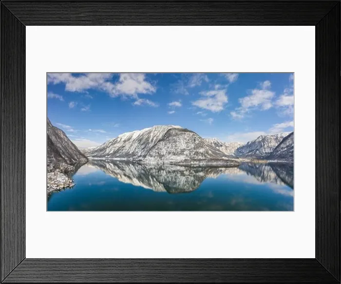 Framed Print : Aerial drone shot of snow covered hill with reflection by Hallst Framed Print : Aerial drone shot of snow covered hill with reflection by Hallst
