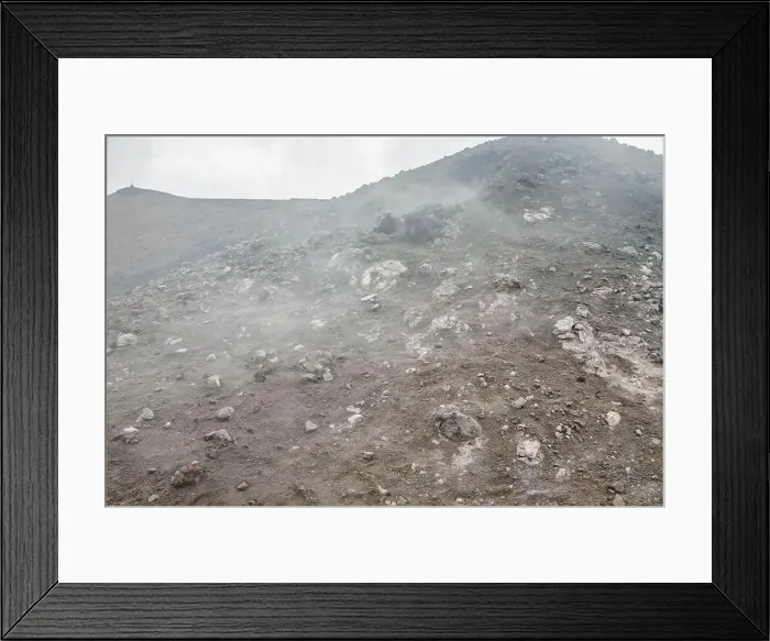 Framed Print : Top of crater Mount Etna volcano, frozen cold lava smokes, thick clouds Framed Print : Top of crater Mount Etna volcano, frozen cold lava smokes, thick clouds
