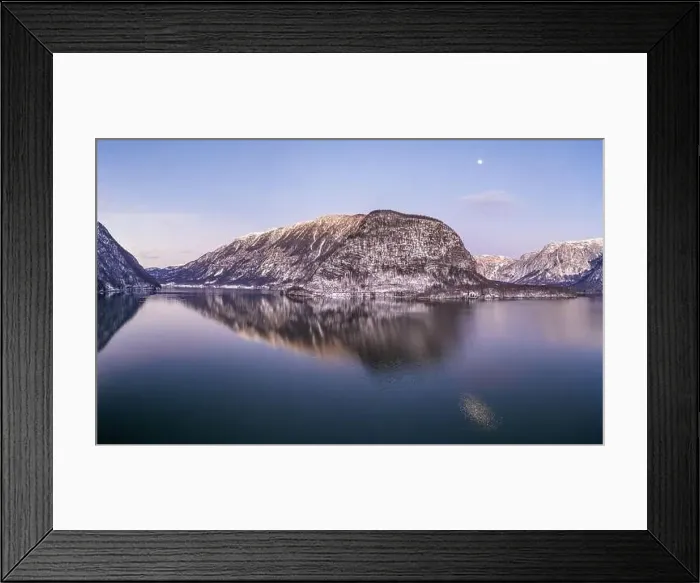 Framed Print : Aerial drone shot of snow covered hill with reflection by Hallst