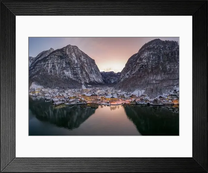 Framed Print : Aerial drone shot of Lahn village covered by snow by lake in Aus Framed Print : Aerial drone shot of Lahn village covered by snow by lake in Aus