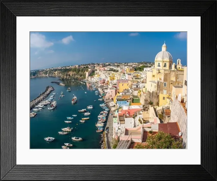 Framed Print : Aerial drone view of vibrantly colorful houses of Marina Corricella in sunny summer weather at Procida island, Italy Framed Print : Aerial drone view of vibrantly colorful houses of Marina Corricella in sunny summer weather at Procida island, Italy