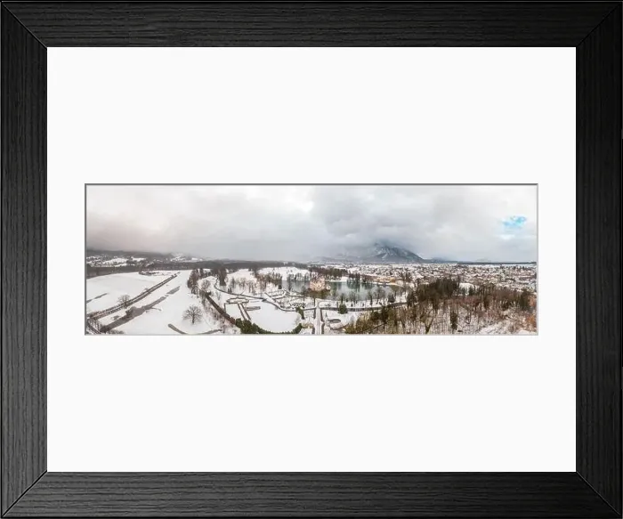 Framed Print : Panoramic aerial drone shot of Anif Schloss moated castle in artificial pond at Salzburg outskirts in heavy snow during Framed Print : Panoramic aerial drone shot of Anif Schloss moated castle in artificial pond at Salzburg outskirts in heavy snow during