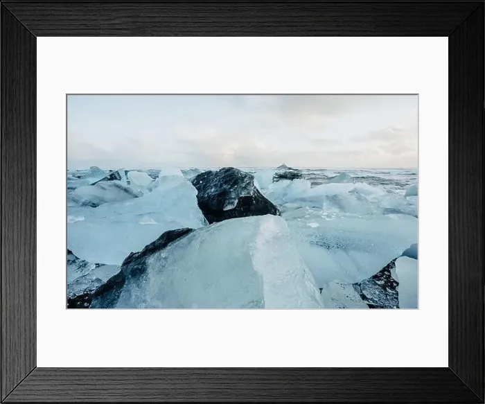 Framed Print : Breathtaking diamond beach on Iceland in winter with large ice blocks, ice cubes Framed Print : Breathtaking diamond beach on Iceland in winter with large ice blocks, ice cubes