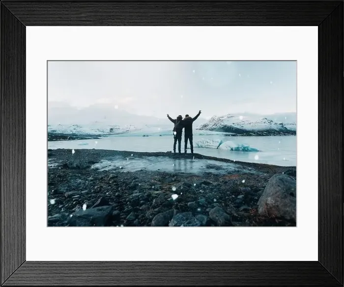 Framed Print : Hiking on a glacier in Iceland, breathtaking views, traveler stands on stone Framed Print : Hiking on a glacier in Iceland, breathtaking views, traveler stands on stone