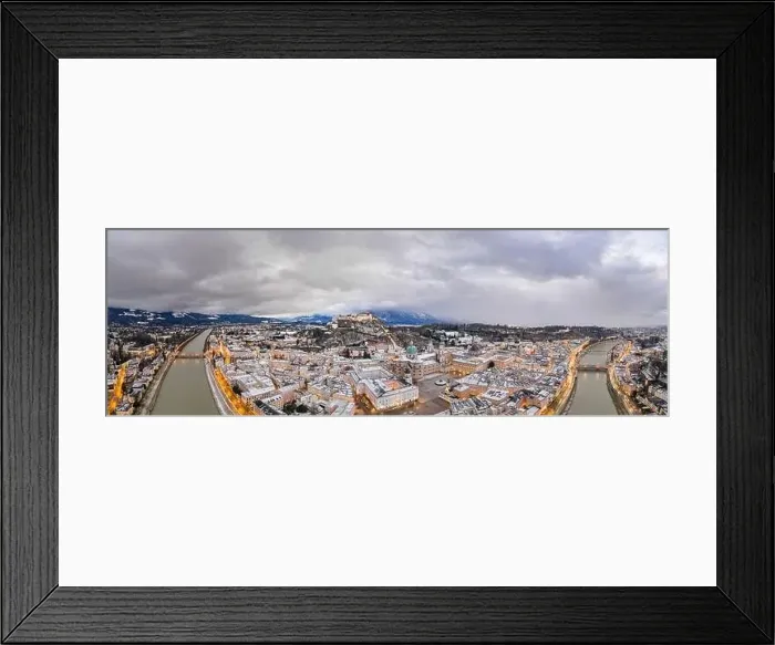 Framed Print : Panoramic aerial drone overview of Salzburg old town skyline covered with snow Framed Print : Panoramic aerial drone overview of Salzburg old town skyline covered with snow