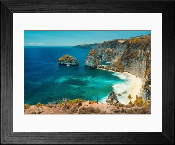 Framed Print : Traveler man standing on top of mountain look at the ocean and rocks Framed Print : Traveler man standing on top of mountain look at the ocean and rocks