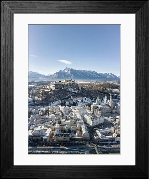 Framed Print : Aerial drone view of snowy Hohensalzburg fortress with view of Unesberg mountain in winter morning Framed Print : Aerial drone view of snowy Hohensalzburg fortress with view of Unesberg mountain in winter morning