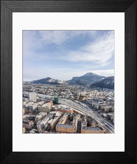 Framed Print : Aerial drone shot view of railway statioin in Salzburg covered with snow in winter morning Framed Print : Aerial drone shot view of railway statioin in Salzburg covered with snow in winter morning