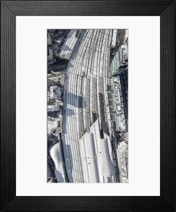 Framed Print : Aerial overhead view of Salzburg railway station with rails covered with snow in winter morning Framed Print : Aerial overhead view of Salzburg railway station with rails covered with snow in winter morning