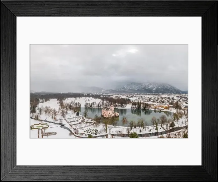 Framed Print : Aerial view of Schloss Anif moated castle in artificial pond Salzburg outskirts in heavy snow view of untersberg Framed Print : Aerial view of Schloss Anif moated castle in artificial pond Salzburg outskirts in heavy snow view of untersberg