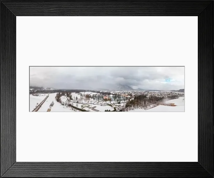 Framed Print : Panoramic aerial view of Schloss Anif moated in artificial pond at Salzburg outskirts in heavy snow during winter view Framed Print : Panoramic aerial view of Schloss Anif moated in artificial pond at Salzburg outskirts in heavy snow during winter view