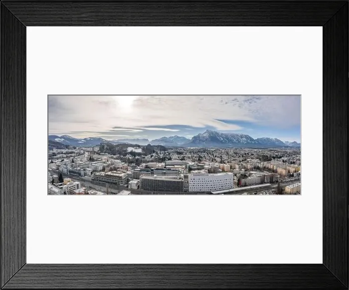 Framed Print : Panoramic aerial view of Salzburg outskirts railway station with view of snowy untersberg and old town Framed Print : Panoramic aerial view of Salzburg outskirts railway station with view of snowy untersberg and old town