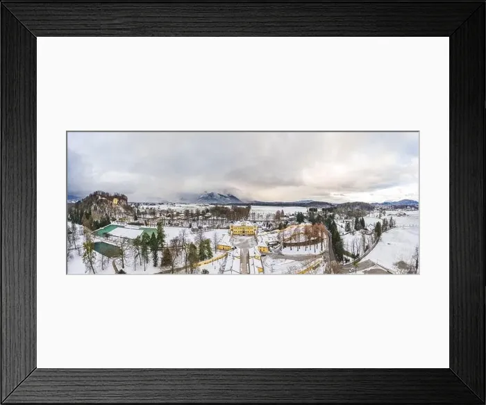 Framed Print : Panoramic aerial view of Schloss Hellbrunn covered in snow with view of Untersberg near Salzburg Outskirts in winter Framed Print : Panoramic aerial view of Schloss Hellbrunn covered in snow with view of Untersberg near Salzburg Outskirts in winter