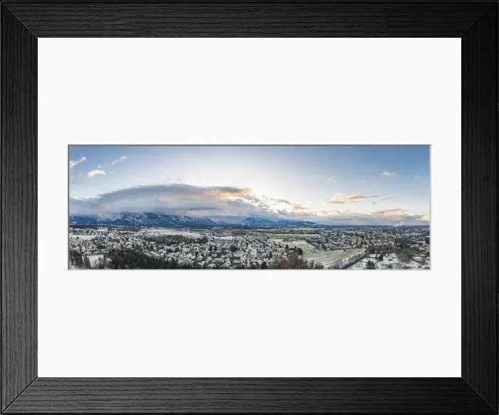 Framed Print : Aerial drone shot view of outskirts and austrian alps untersberg with heavy fog in winter Framed Print : Aerial drone shot view of outskirts and austrian alps untersberg with heavy fog in winter