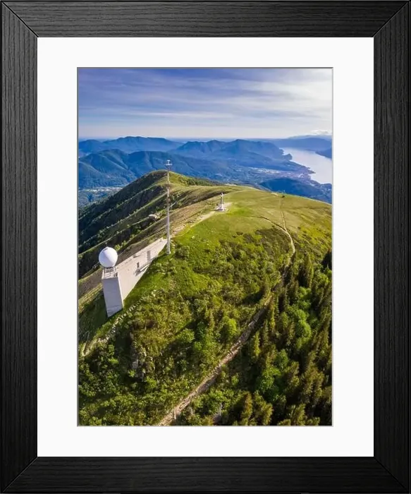 Framed Print : Aerial view from the top of Monte Lema towards Lake Maggiore with its cableway and refuge