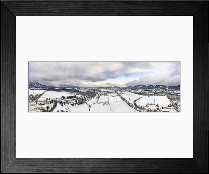 Framed Print : Panoramic aerial view of Salzburg outskirts snowy villages during sunset hour with clouds after snow storm in winter Framed Print : Panoramic aerial view of Salzburg outskirts snowy villages during sunset hour with clouds after snow storm in winter