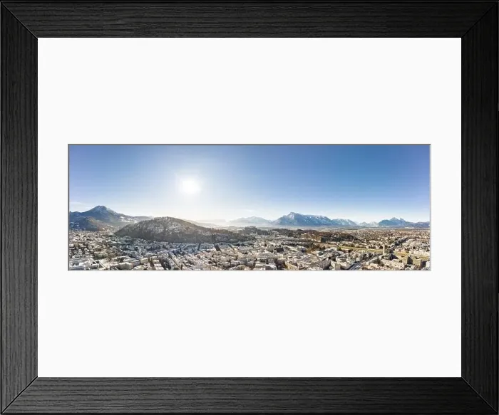 Framed Print : Panoramic aerial drone view of Salzburg snowy old town with view of Unesberg Kapuzinerberg mountain in winter morning Framed Print : Panoramic aerial drone view of Salzburg snowy old town with view of Unesberg Kapuzinerberg mountain in winter morning
